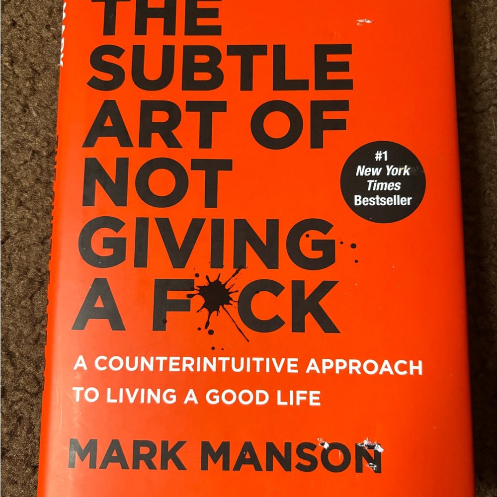 The Subtle Art of Not Giving a F*ck by Mark Manson - Orange Cover